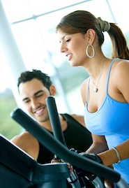 Woman exercising in gym.